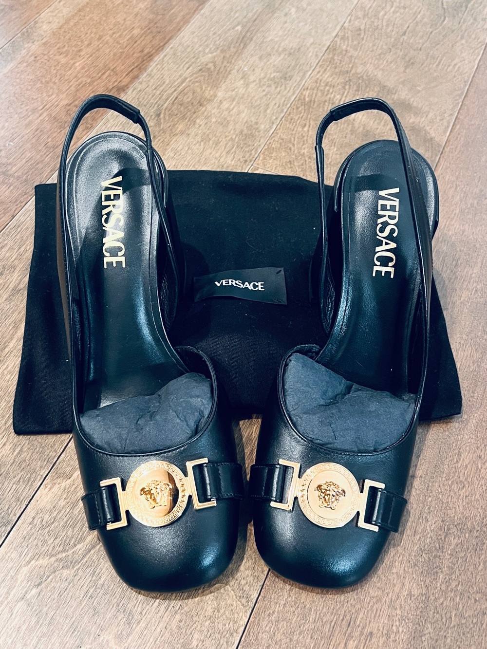 Classic Versace Black Leather Slingback Heels with Gold Medallion Accent